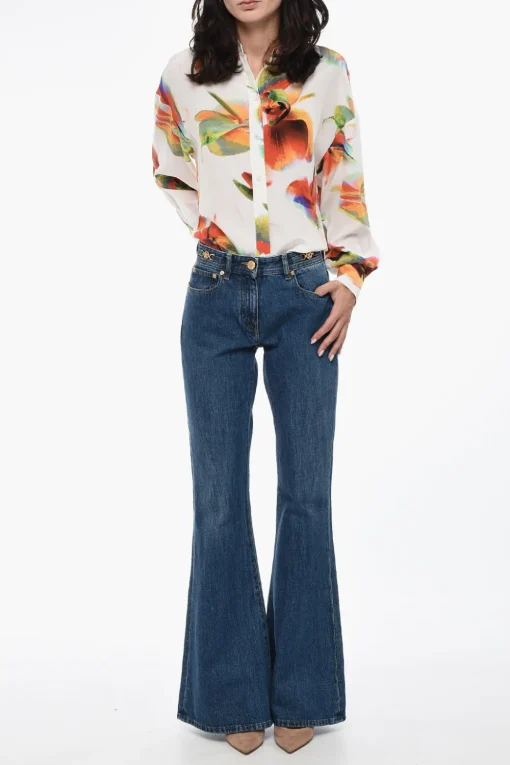 Jeans Bootcut in Cotone con Morsetti Logati 32cm>Versace Fashion