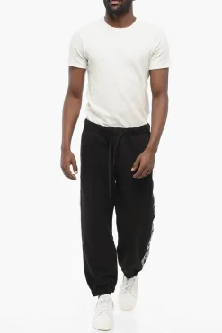 JEANS COUTURE Joggers in Cotone con Bande Laterali Logate></noscript>Versace Fashion