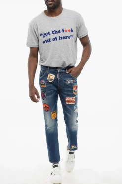 Jeans Skater Fit in Denim Delavè con Toppe Ricamate 15cm></noscript>Dsquared2 New