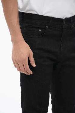 Jeans Skinny Fit con Risvolto in Denim Spalmato 15cm></noscript>Neil Barrett Outlet