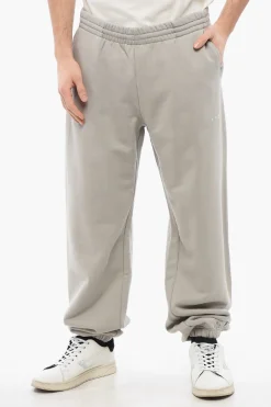 Discount Joggers in Cotone Garzato in Tinta Unita con Logo in Rilievo Uomo Pantaloni