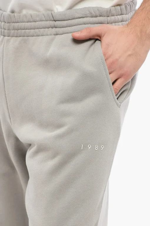 Discount Joggers in Cotone Garzato in Tinta Unita con Logo in Rilievo Uomo Pantaloni