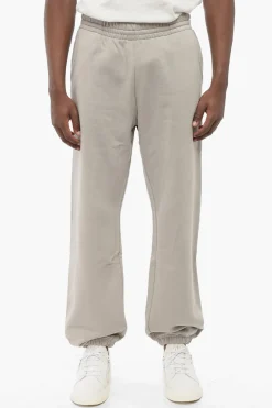 Discount Joggers in Cotone Garzato in Tinta Unita con Logo in Rilievo Uomo Pantaloni