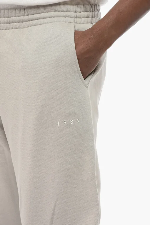 Discount Joggers in Cotone Garzato in Tinta Unita con Logo in Rilievo Uomo Pantaloni