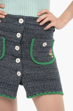 Mini Gonna CHIARA in Lurex con Tasche Frontali e Bottoni Decorativi></noscript>Cormio Fashion