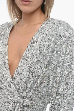 Minidress a Portafoglio in Paillettes></noscript>Rotate Hot