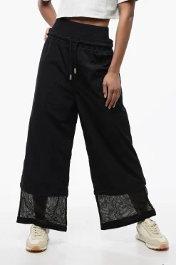Outlet Pantaloni CRISPY in Nylon a Gamba Ampia con Polsini Removibili Donna Pantaloni