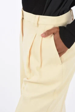Pantaloni Flare Effetto Crepe a Vita Alta a Due Pinces></noscript>Tory Burch Hot