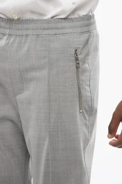 Pantaloni REM Slim Fit con Elastico in Vita e Zip alla Caviglia></noscript>Neil Barrett Fashion