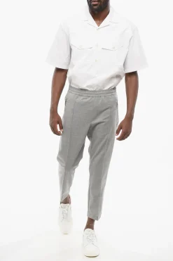 Pantaloni REM Slim Fit con Elastico in Vita e Zip alla Caviglia></noscript>Neil Barrett Fashion