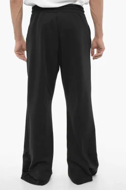 Pantaloni Track a Gamba Larga con Elastico In Vita>Marcelo Burlon New
