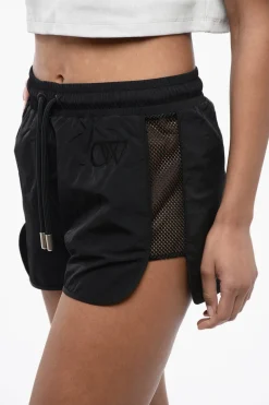 New Shorts CRISPY in Nylon con Banda Laterale in Rete Donna Pantaloni